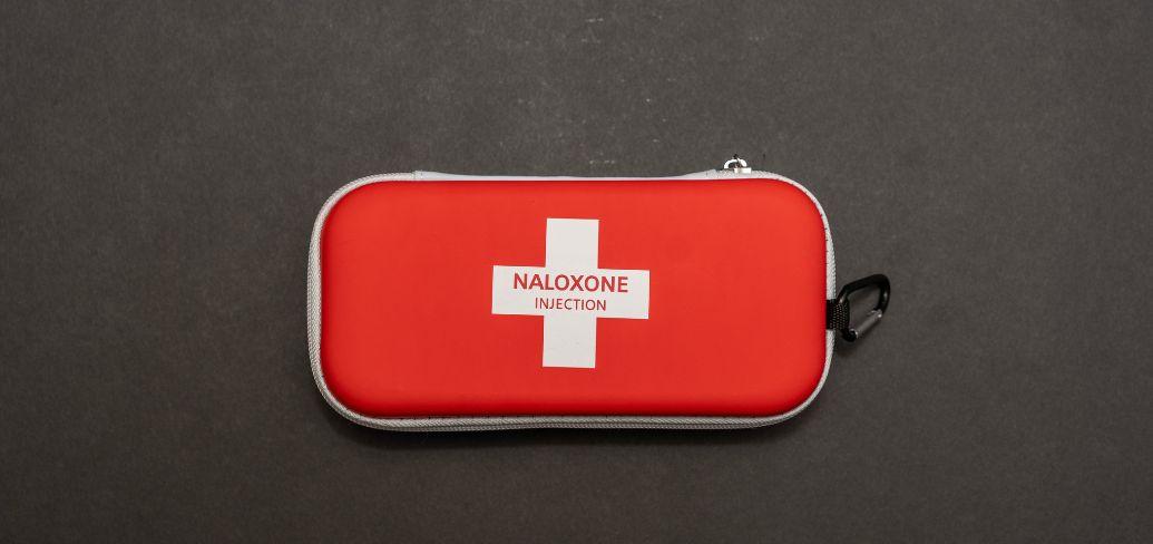 image of a red naloxone kit