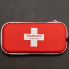 image of a red naloxone kit