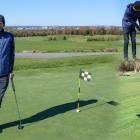 image of a person posing on a golf course and also taking practice shots